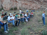 Students listening to a lecture by Rusty Wheaton